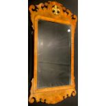 A George II style walnut vauxhall mirror/looking glass, pierced with gilt fleur de lys, 80cm high,