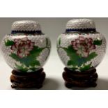 A pair of Chinese Cloisonné ginger jars and covers, each on hardwood stand, 13cm high overall