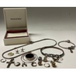 A Pandora bracelet and necklace; a 925 bracelet; a pendant; charms; etc