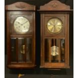 An early 20th century oak cased wall clock, arched case, Roman numerals, twin winding holes, 80cm;