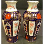 A pair of Royal Crown Derby 1128 pattern baluster vases, 18cm high (2)