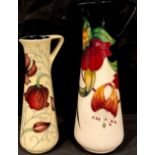 A Moorcroft Anna Lily pattern tapering cylindrical jug, angular handle, 24cm, impressed and