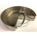 A Tudric pewter circular hors D'oeuvre dish, planished scroll handle, pattern number 01600, one