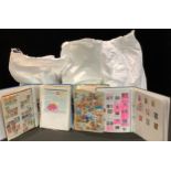 Stamps - three large bags of material, albums, binders, vast quantity