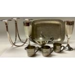 A Norwegian Skurdal pewter tray with three cups; a 20th century three branch table candlestick,