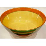 A Clarice Cliff Bizarre Liberty's Stripe pattern bowl, painted in bands of green, orange, yellow and