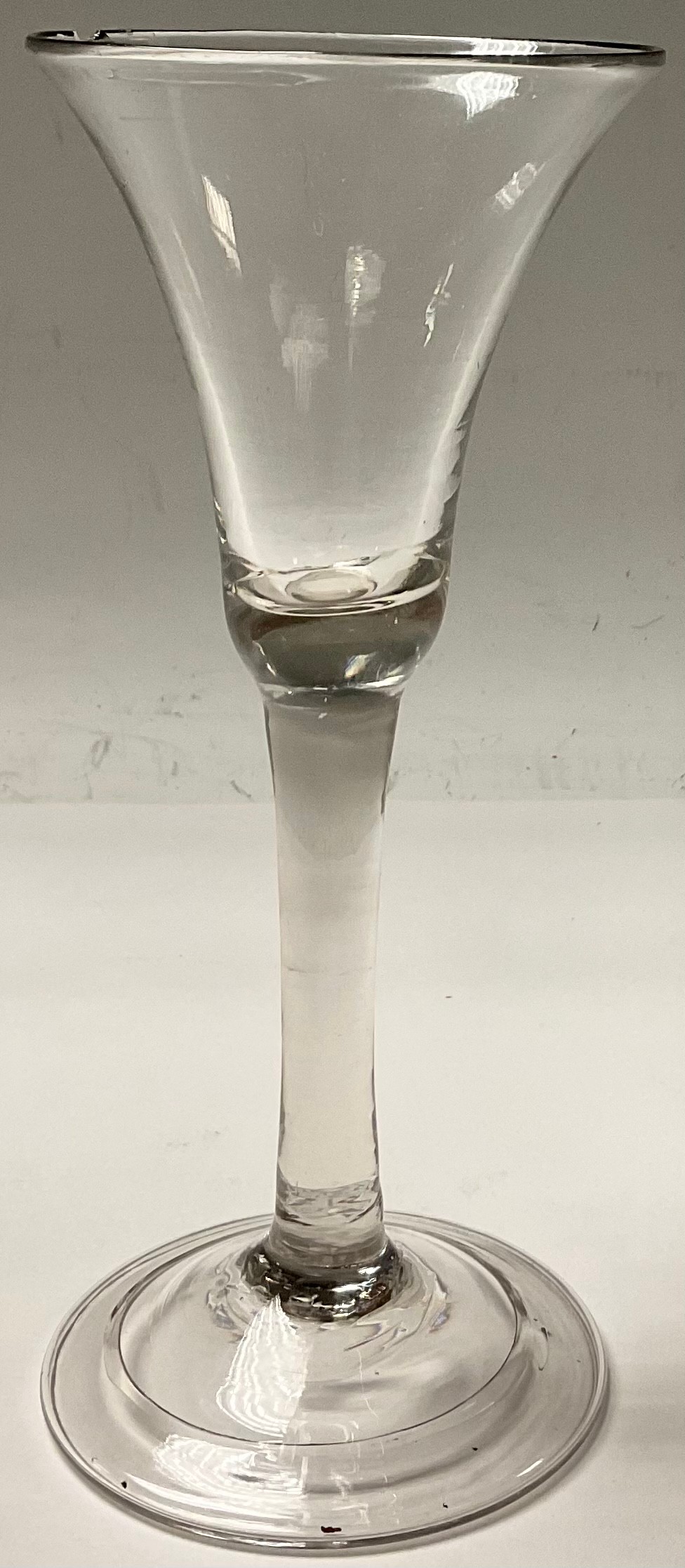 A George II wine glass, bell shaped bowl, hollow stem, folded foot, c.1740