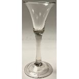 A George II wine glass, bell shaped bowl, hollow stem, folded foot, c.1740