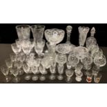 Glassware - a set of six cut glass wine glasses, each engraved with flower heads; a set of six cut