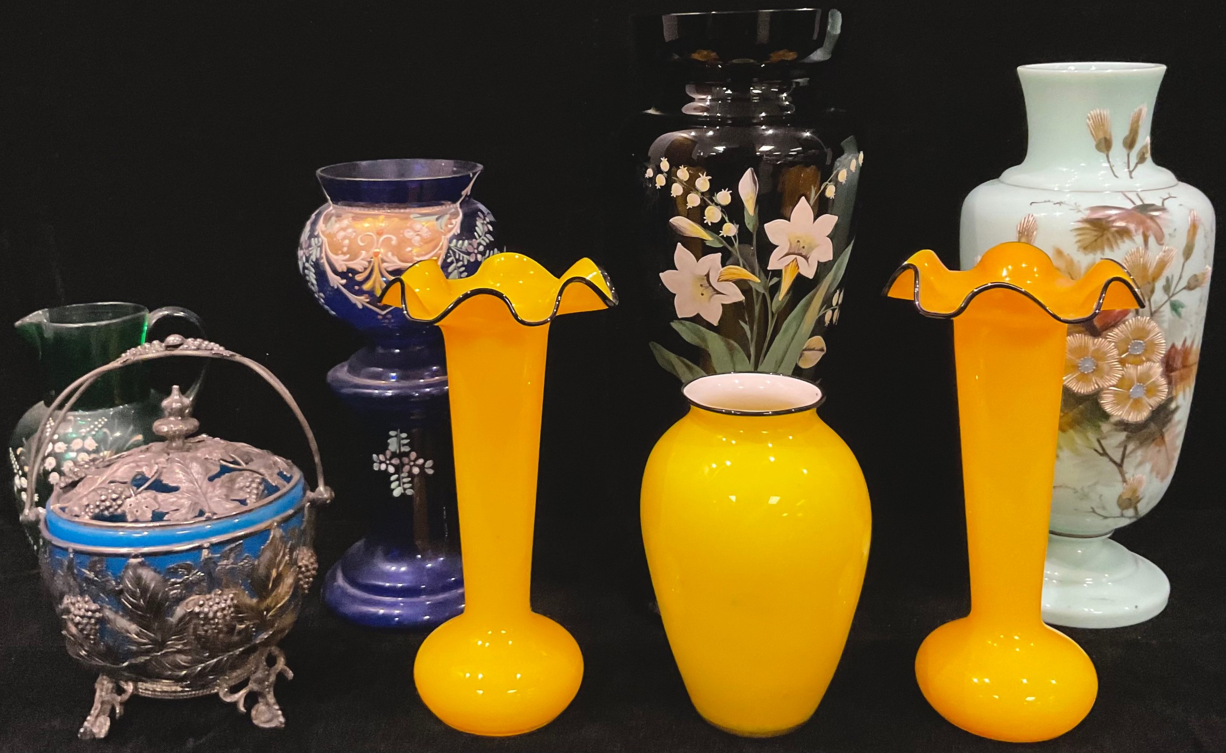 A pair of opaque yellow glass vases, blue fluted edges, 20.5cm; a similar Loetz type ovoid vase;