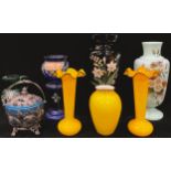 A pair of opaque yellow glass vases, blue fluted edges, 20.5cm; a similar Loetz type ovoid vase;