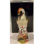 A Royal Crown Derby paperweight, Green Woodpecker, gold stopper, printed marks, boxed