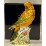 A Royal Crown Derby paperweight, Sun Parakeet, gold stopper, boxed