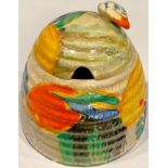 A Clarice Cliff Citrus Delecia pattern basket weave honey pot and cover, the domed cover