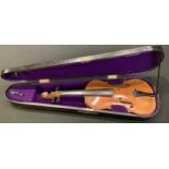 Musical Instruments - a violin, the two piece back 36.25cm excluding button, 59cm long overall,