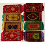 A collection of eight Victorian dolls house Persian rugs