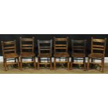 A harlequin set of six beech and elm bar back Sunday school chairs, the largest 64.5cm high, 32cm