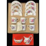 A Royal Crown Derby Posie pattern coffee set for six, printed marks in green, original box; a