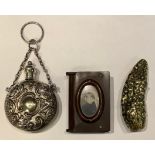 A 19th century brass novelty vesta case, as a gherkin, hinged cover, 6cm long; a vulcanite vesta