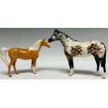 A Beswick model of an Appaloosa horse; another Beswick horse (2)