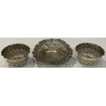 A Victorian silver sweetmeat dish, Birmingham 1896; a pair of silver salts, Birmingham 1897 (3)