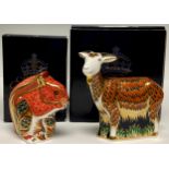 A Royal Crown Derby paperweight, Nanny Goat, gold stopper, boxed; another, Red Squirrel, gold