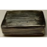 A George III silver snuff box, hinged reeded cover, gilded interior, indistinctly marked, 4cm