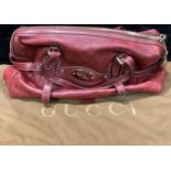 Fashion - a Gucci Italian red leather '85th Gucci' handbag, with protective cloth bag