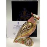 A Royal Crown Derby paperweight, Cockatoo, specially commissioned limited edition, 1,464/2,500, gold