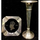 A silver trumpet vase, Birmingham 1993; a silver and glass ashtray, commemorating 1935 jubilee,