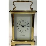 A brass five glass carriage clock, H Samuel, white dial, Roman numerals, Duverdrey & Bloquel France,