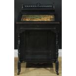 A late Victorian Aesthetic Movement ebonised Davenport desk, hinged rectangular superstructure
