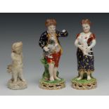 A pair of Derby figures, of a boy and girl, standing bare footed, holding lamb and dog, pierced