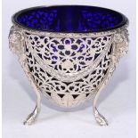 A George V Adam Revival silver sweetmeat bowl, pierced with scrolling foliage and cast with ram