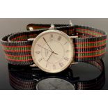 A gentleman's Longines stainless steel watch, Roman numerals, date aperture, later strap