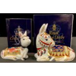 A pair of Royal Crown Derby paperweights, Thistle Donkey and Holly Donkey, Goviers exclusive