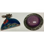 An Art Deco enamel brooch, as ballroom dancers; a Ruskin type brooch (2)