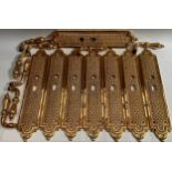 Interior Furnishings - a set of four gilt metal door plates, cast with trellis and flowerheads, 47cm