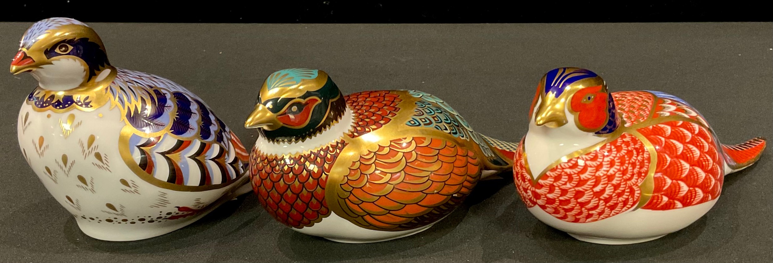 A Royal Crown Derby paperweight, Pheasant, gold stopper; others, Red Legged Partridge, 21st