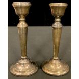 A pair of Elizabeth II silver candlesticks, 15.5cm high, Birmingham 1972