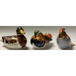 A Royal Crown Derby paperweight, Mandarin Duck, silver stopper; others, Mallard, silver stopper;
