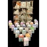 A set of twelve Franklin Mint miniature ceramic animal models, Austrian crystal shaped bases,