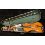 A concert violin and bow, Stradivarius label, wooden case