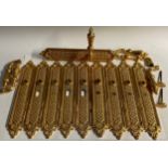 Interior Furnishings - a set of ten gilt metal door plates, cast with trellis and flowerheads, 38.