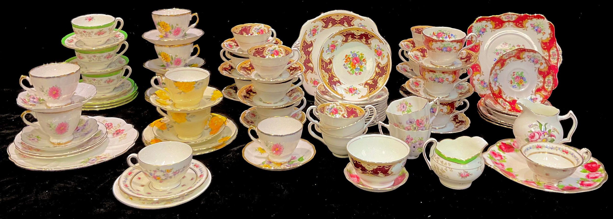 A Gainsborough China floral pattern tea service for twelve, comprising cake plate, sugar bowl,