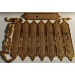 Interior Furnishings - a set of four gilt metal door plates, cast with trellis and flowerheads, 47cm