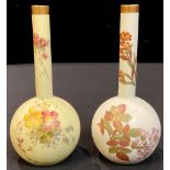 A Royal Worcester blush ivory globular bottle vase, decorated with flowers, picked out in gilt,
