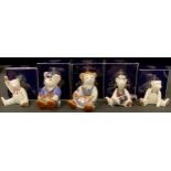 A Royal Crown Derby paperweight, School Boy Teddy, gold stopper, boxed; others, School Girl Teddy,