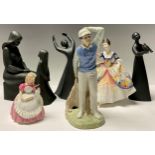 A Royal Doulton figure, Christine HN2792; others, Cookie HN2218, Golfer HN2992; Awakening HN2837,