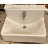A white ceramic sink, Ikea tap